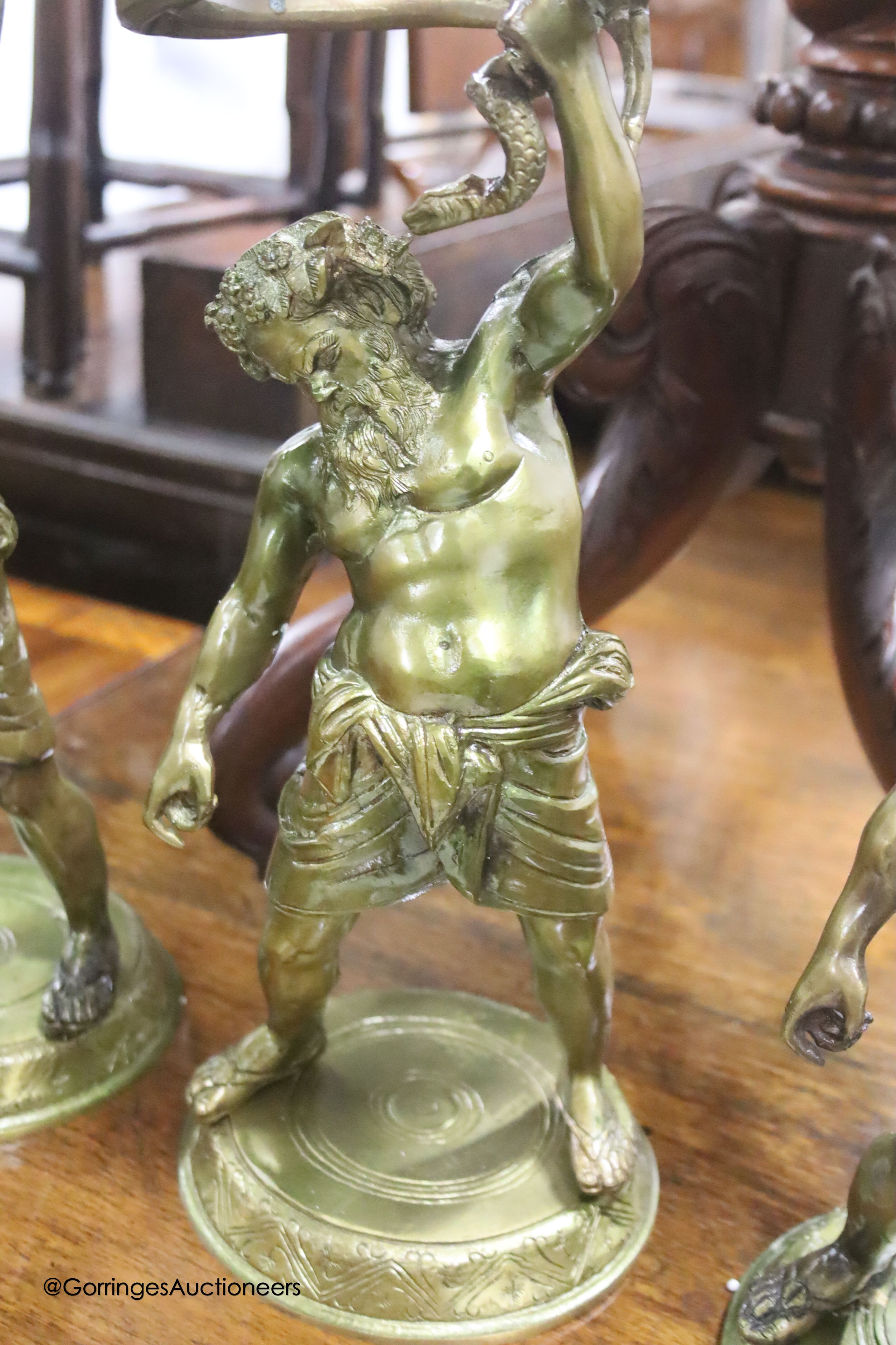 Six cast gilt metal figures of Hercules, height 42cm